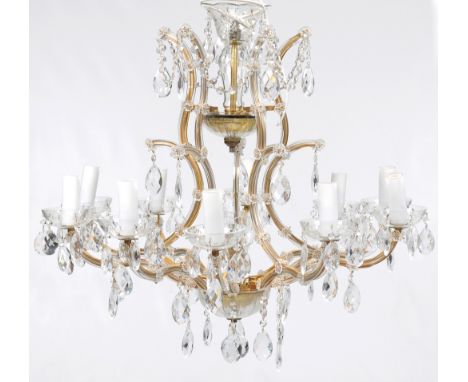 A ten branch glass chandelier of Venetian design
With a bell shape top with five curvilinear branches applied with flower hea