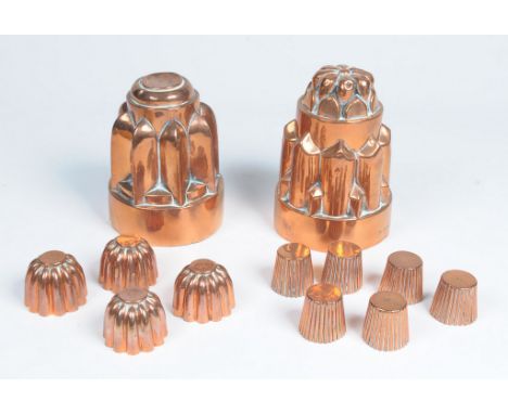 A collection of twelve jelly moulds, Victorian-Edwardian
The first stamped D Horsley No: 14, the skirt with large and small p