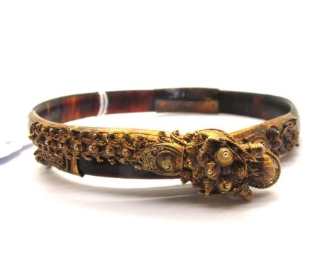A Chinese Style Tortoiseshell Wrap Bangle, applied gilt dragon detail to terminals, with intricate wirework decoration throug