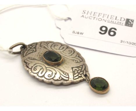 Murrle Bennett &amp; Co; An Arts &amp; Crafts Pendant, the shaped oval panel with engraved decoration, oval collet set to the