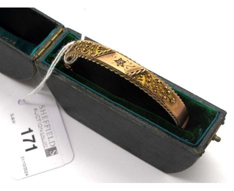 An Early XX Century 9ct Gold Single Stone Diamond Set Hinged Bangle, Chester 1901, the old cut diamond collet set within star