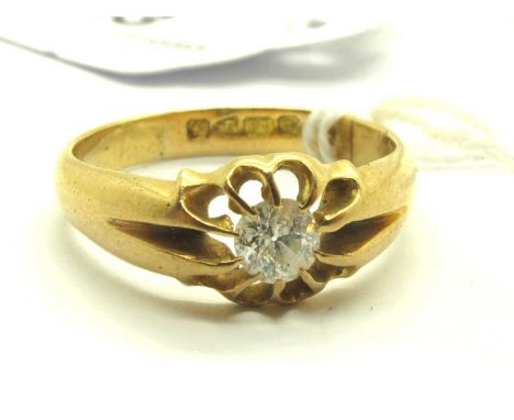 A Chester Hallmarked 18ct Gold Single Diamond Ring, the brilliant cut round diamond claw set to centre, within reeded taperin
