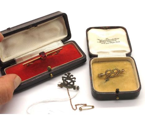 An Antique Seed Pearl Staffordshire Knot Brooch, to a plain bar setting (approximately 3cm long), within a vintage "The Sheff