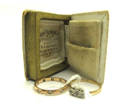 An 18ct Gold Three Stone Diamond Ring, the brilliant cut stones illusion set between tapered band (finger size N); A Stone Se