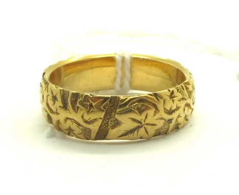 A Victorian 18ct Gold Patterned Band Ring, of stylised leaf design, Birmingham 1896 (finger size N1/2) (6grams).
