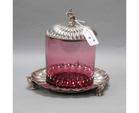 A TH&amp;S Electroplated and Cranberry Glass Biscuit Box, the fluted pull of cover with bird of prey finial, on scalloped bas