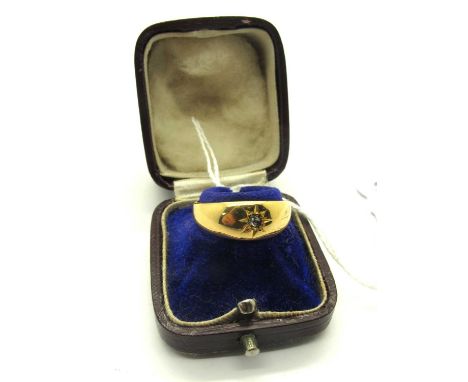 An 18ct Gold Single Stone Diamond Ring, (marks rubbed), the brilliant cut diamond circular collet set to centre, within starb