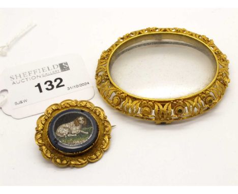 A Decorative XIX Century Micromosaic Locket Back Brooch, depicting a dog lying on grass (border damage), within decorative le