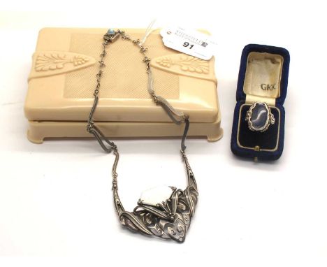 A Jugendstil Style Necklace / Brooch, the pendant of pierced angular design with foliage detailing, suspended on a scrolling 