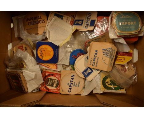 A large collection of vintage advertising beer mats to include national and local companies such as John Smiths, Wills, Rayme