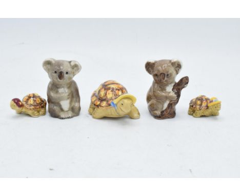 A collection of Beswick to include Koala bear on branch 1039 and baby koala 1040 together with family of tortoises (5). In go