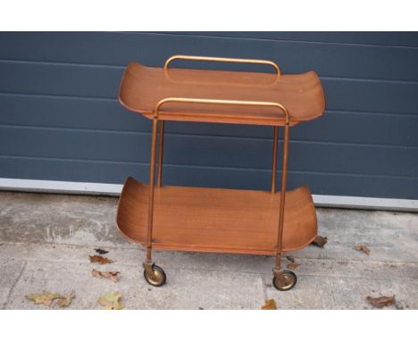 A retro mid century / vintage two-tier tea / hostess trolley made with Danish Style teak or similar vacuum-pressed wood with 