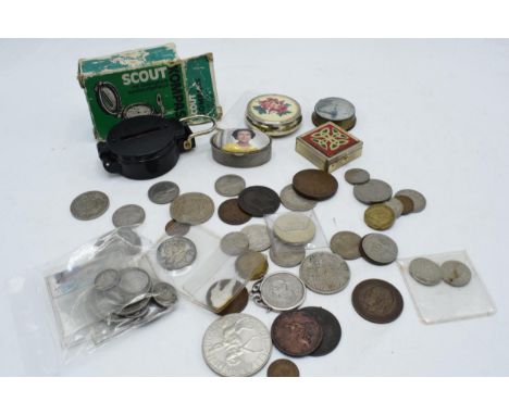 A mixed collection of items to include coinage from around the world to include British pre 1946 coins and pre 1920 coins, a 