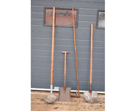 Agricultural interest: a collection of farming and gardening tools to include a spade, a shovel, a ditch dirt scoop and a soc