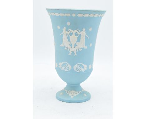 An unusual Wedgwood Jasperware vase in a light blue / aqua blue colour with traditional scenes. 19cm tall. In good condition 