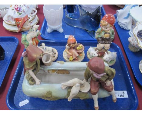 Royal Dux planter with two figures, number '1665' Goebel figure of a girl with chicks, two others.