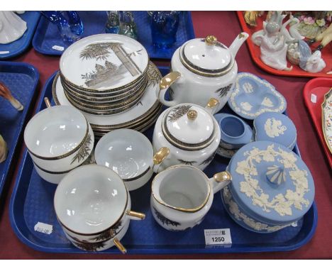 A Japanese 'Hayasi Kutani fine china' geisha girl tea service together with a small collection of blue Wedgwood Jasperware. 1