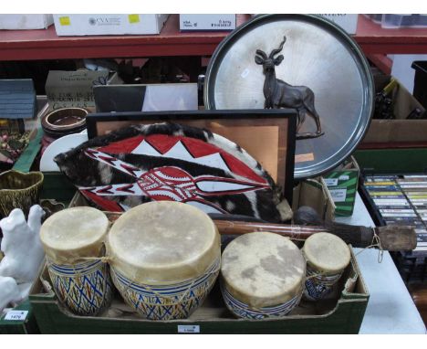 Carved African Maks, bongo drums, etc:- One Box.