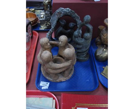 A terracotta figure of four friends in a circle candle holder together with two Mayan Aztec pottery style folk art. (3)