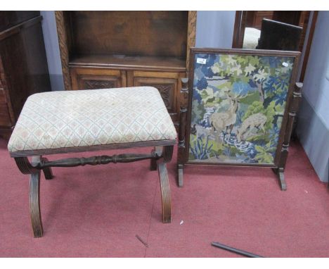 A XX Century Mahogany 'X' Shaped Stool, with an upholstered top; together with an oak firescreen with tapestry panel. (2)