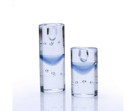 Timo Sarpaneva (1926-2006) for IittalaTwo 'Arktia' glass candlesticks, unmarked, tallest measures 19.5cm high, the smallest m
