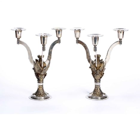 Hector Miller (b.1945) for Aurum DesignsPair of silver and silver-gilt candelabra, bearing marks for Hector Miller, London, 1