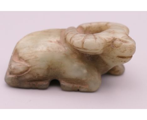 A jade model of a water buffalo.  5.5 cm long. 