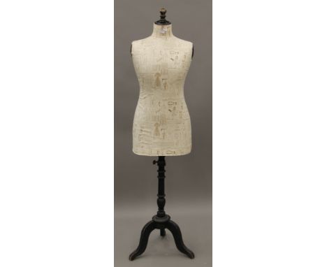 A recovered vintage French dress makers mannequin. 158 cm high.
