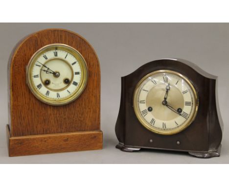 A Victorian oak mantle clock and a Smiths bakelite mantle clock. The former 24 cm high.  