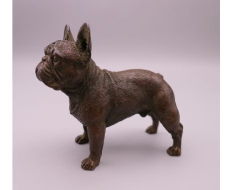 A bronze model of a French bulldog.  7.5 cm long, 7 cm high. 