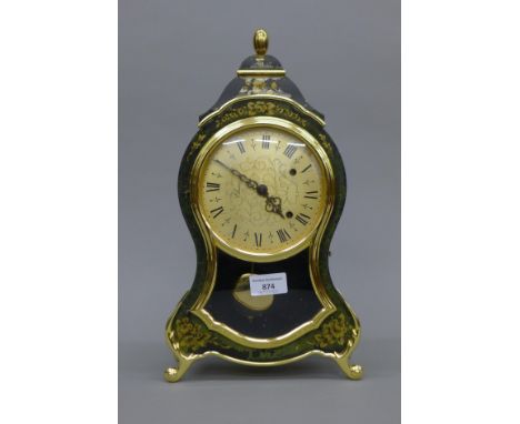 A mantle clock. 38 cm high.