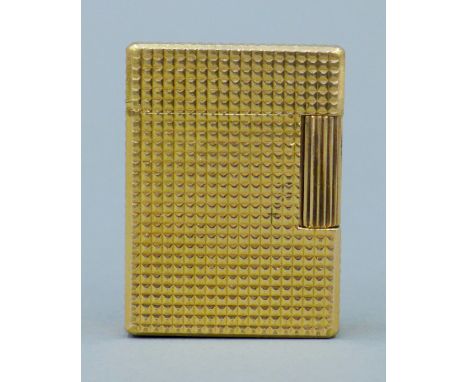 A gold plated S J Dupont gas lighter. 