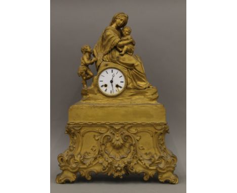 A 19th century gilt bronze and brass mantle clock. 57 cm high.