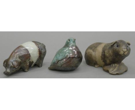 A Poole guinea pig, a pottery pig and a pottery bird. The former 12.5 cm long.