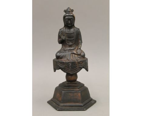 A bronze model of Buddha. 28 cm high.