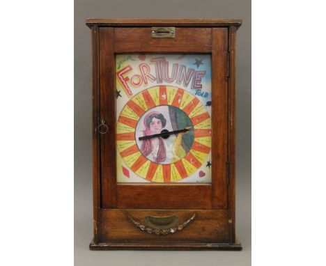 A vintage penny slot fortune machine. 41.5 cm wide.