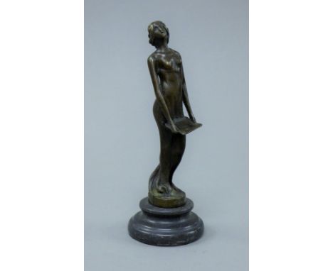 A bronze model of a singing girl. 19 cm high.