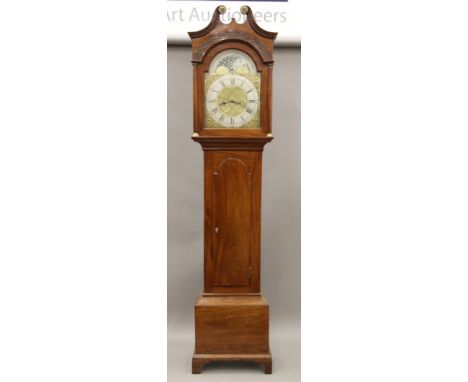 A 19th century mahogany longcase clock, the dial inscribed Jonathan Rowlands Berwick. 225 cm high.   Dial 31 cm diameter.