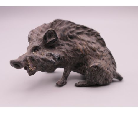 A cold painted bronze model of a boar.  6 cm long. 