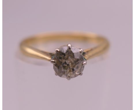 An 18 ct gold diamond solitaire ring, the claw set stone spreading approximately to .50 carat.. Ring size L. 2.4 grammes tota