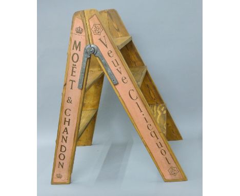 A wooden champagne ladder. 86.5 cm high.