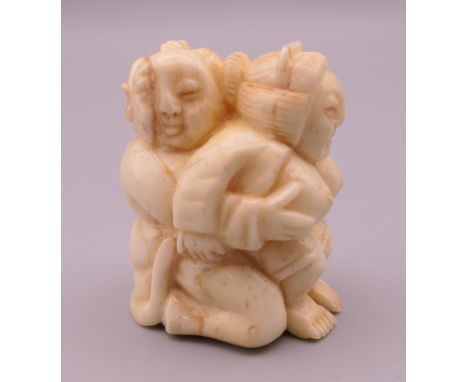An erotic bone netsuke.  4.5 cm high. 