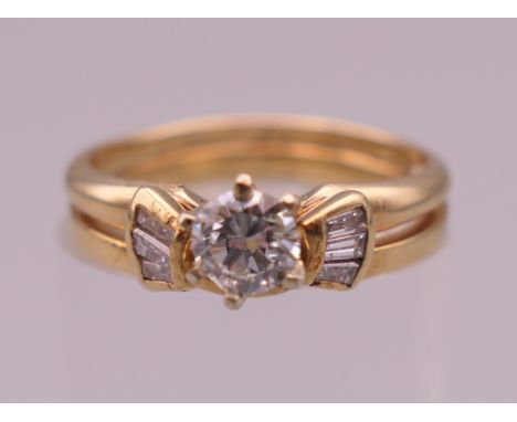 A 14 ct gold diamond solitaire ring. Ring size K/L. 3.2 grammes total weight. 