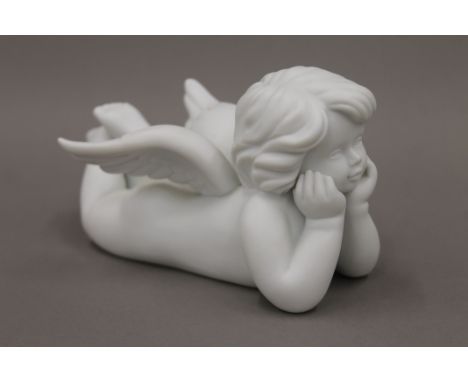 A Rosenthal bisque model of a cherub. 17 cm long.