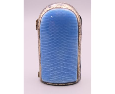 A silver and enamel scent bottle holder.  6 cm high. 