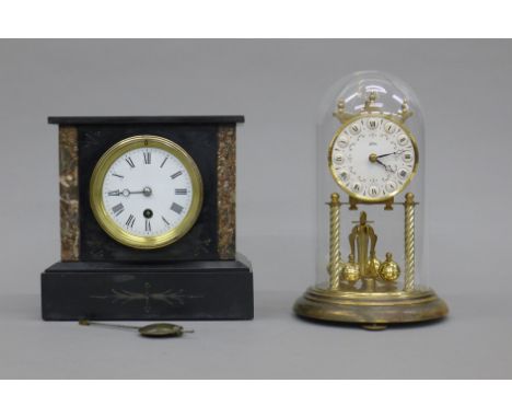 A marble mantle clock and an anniversary clock. The former 20 cm high.