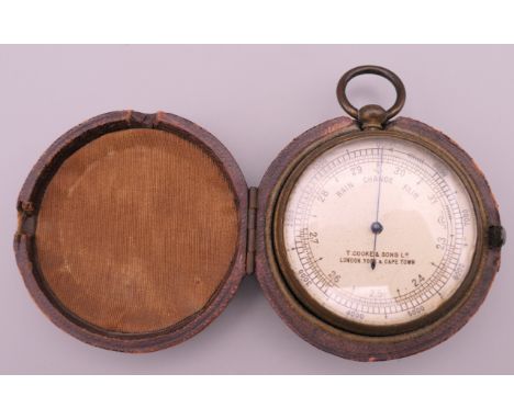 A T Cooke &amp; Sons Ltd pocket barometer, in leather case.  5 cm diameter.