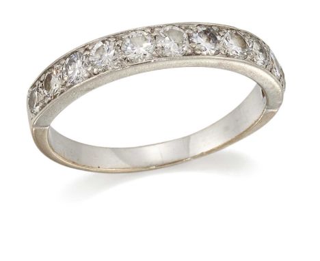 A DIAMOND HALF HOOP RING round brilliant-cut diamonds to a flat-sided shank. Estimated total diamond weight 1.10ct, ring size