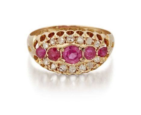 AN EARLY 20TH CENTURY RUBY AND DIAMOND RING five graduated cushion-cut rubies within a border of diamond accents, in an exten