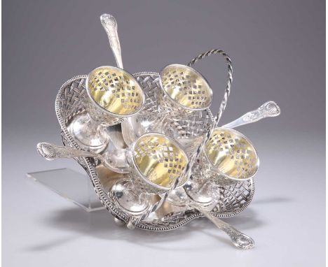 A VICTORIAN SILVER EGG CRUET by Henry Wilkinson &amp; Co, Sheffield 1859, the lobed stand with latticework sides and swing-ha